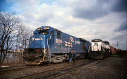 CR-GM-EMD-B23-7-2808_CR-GE-U23B-2797_LIRR-EMD-MP15ACs-152_Fresh-Pond-Junction_viewN_c.mid1980s.jpg (88746 bytes)